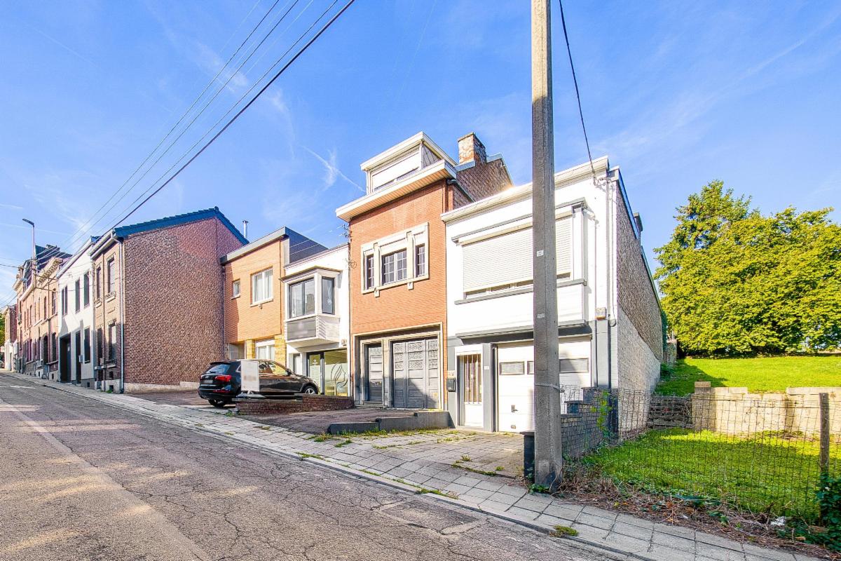 Photo 2 du bien Agréable maison à rénover avec jardin et parking