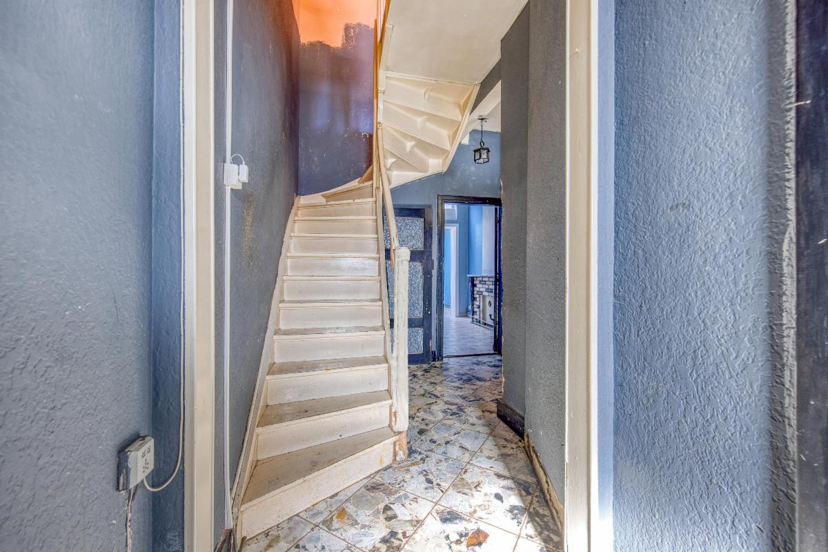 Photo 3 du bien Agréable maison à rénover avec jardin et parking