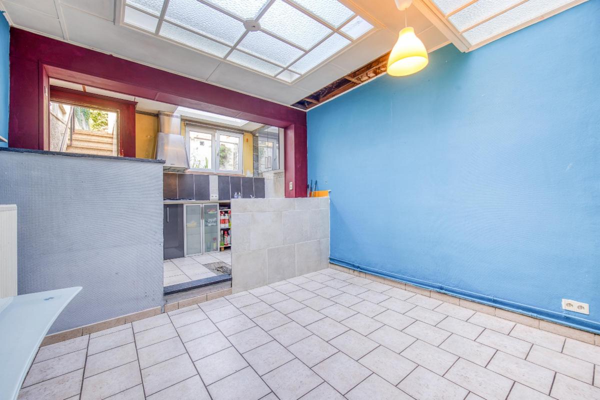 Photo 5 du bien Agréable maison à rénover avec jardin et parking