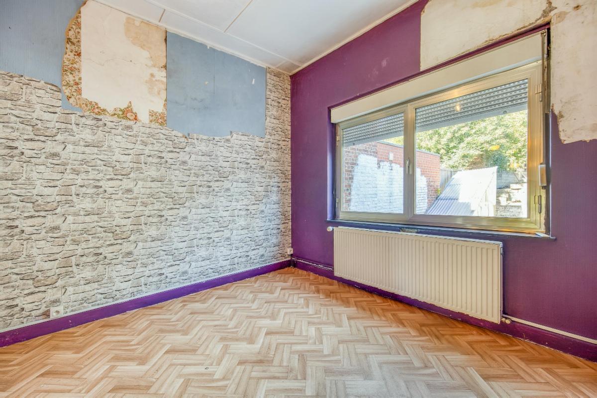 Photo 11 du bien Agréable maison à rénover avec jardin et parking